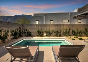 Outdoor pool, pool umbrellas, sun loungers