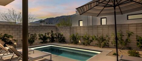 Outdoor pool, pool umbrellas, pool loungers