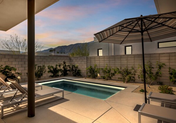 Outdoor pool, pool umbrellas, pool loungers