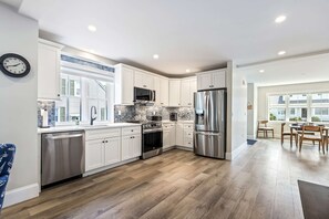 House, Multiple Beds, Patio, Garden View (Bourne By The Beach) | Private kitchen