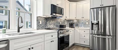 House, Multiple Beds, Patio, Garden View (Bourne By The Beach) | Private kitchen | Fridge, microwave, oven, stovetop