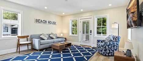 House, Multiple Beds, Patio, Garden View (Bourne By The Beach) | Living area | 42-inch flat-screen TV with digital channels