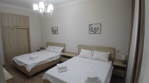 1 chambre, fer et planche à repasser, accès Internet, draps fournis
