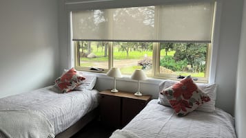 2 habitaciones, tabla de planchar con plancha, wifi y ropa de cama