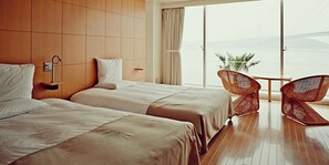 Chambre avec lits jumeaux, vue mer