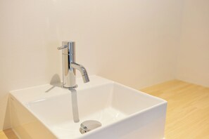 Apartment, Non Smoking (501, 3 people) | Bathroom | Hair dryer, slippers, towels, shampoo - Liverty Place Nakano (Tokyo)