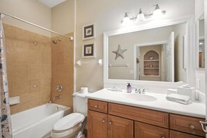 Shower, hair dryer, towels, shampoo