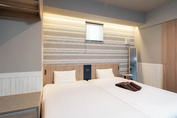 Kamar Quadruple Superior | Wi-Fi gratis dan seprai linen