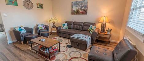 Smart TV, fireplace, books, printers