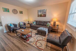 Smart TV, fireplace, books, printers