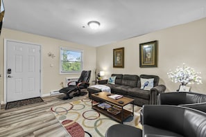 Smart TV, fireplace, books, printers