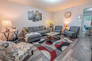 Smart TV, fireplace, books, printers