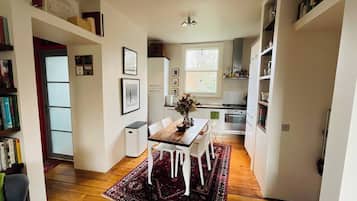 Shared Dormitory, 1 Bedroom, Patio, Garden View | Dining room
