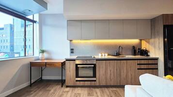 Fridge, microwave, stovetop, coffee/tea maker