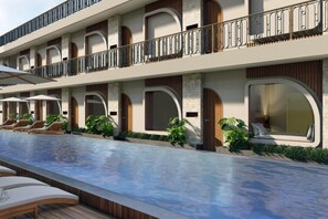 Piscine extérieure, parasols de plage, chaises longues