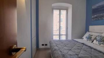 2 Schlafzimmer, BĂŒgeleisen/BĂŒgelbrett, BettwĂ€sche