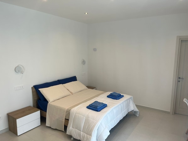 Premium bedding, down duvets, memory-foam beds, in-room safe