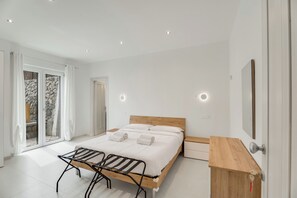 Resortwoning, Meerdere bedden, airconditioning, uitzicht op de stad | Luxe beddengoed, donsdekens, bedden met traagschuimmatrassen