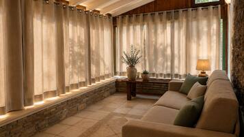 Apartment, Garden View | Living area | 27-inch LCD TV with digital channels