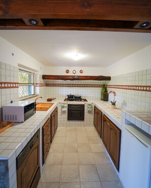 Quadruple Room, Garden View | Private kitchen | Mini-fridge, microwave, espresso maker