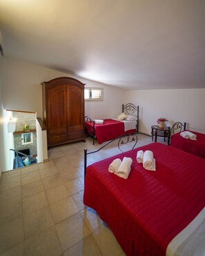 Quadruple Room, Garden View | Minibar, free cribs/infant beds, free WiFi, bed sheets