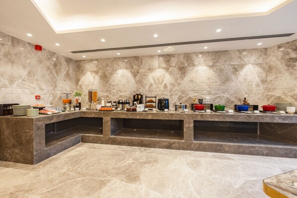 Daily buffet breakfast (INR 250 per person)