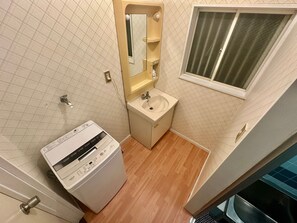 Hair dryer, towels, soap, toilet paper