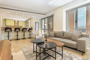 55-inch Smart TV with cable channels, streaming services - Solidere Lavish Apartments in Downtown Beirut (Beirut)