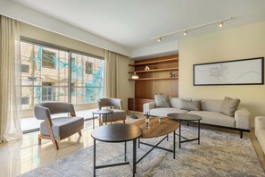 Harmony | Living room | 55-inch Smart TV with cable channels, streaming services - Solidere Lavish Apartments in Downtown Beirut (Beirut)