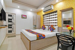 Habitación Deluxe | Sábanas de algodón egipcio, ropa de cama de alta calidad, caja fuerte