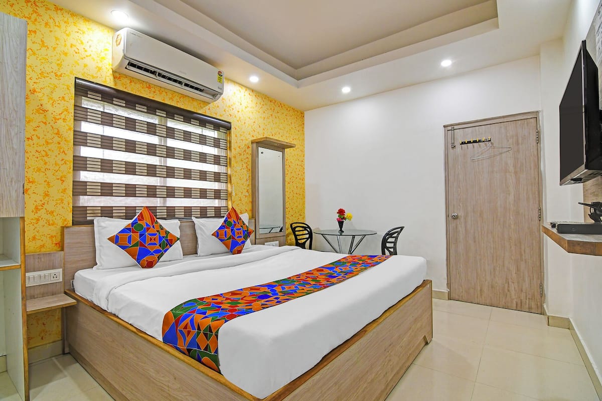 ห้องดีลักซ์ | ผ้าปูที่นอนฝ้ายอียิปต์, เครื่องนอนระดับพรีเมียม, ตู้นิรภัยในห้องพัก