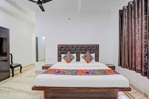 Chambre exécutive | Draps en coton égyptien, literie de qualité, coffre-fort