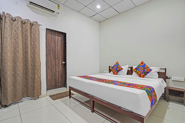 Deluxe kamer | Lakens van Egyptisch katoen, luxe beddengoed, een kluis op de kamer