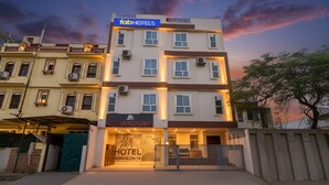 A multi-story hotel building with a sign for 'fabHOTELS' and 'HOTEL BUNGALOW 14'. - Fabhotel Bungalow 14 (Jaipur)