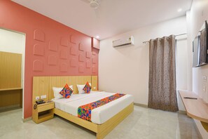Deluxe Room | Egyptian cotton sheets, premium bedding, in-room safe, free WiFi - FabHotel Black Pepper- Nr. Batra Heart & Multispecialty Hospital Faridabad (Faridabad)