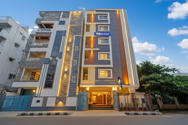 A modern hotel building with a prominent entrance, balconies, and a sign for 'fobHotels'. - Fabhotel Rio Hitech City (Hyderabad)