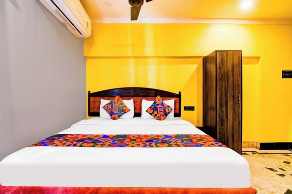 Chambre Deluxe | Draps en coton égyptien, literie de qualité, coffre-fort