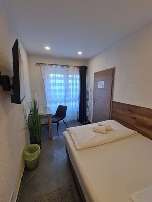 Desk, iron/ironing board, free WiFi, bed sheets