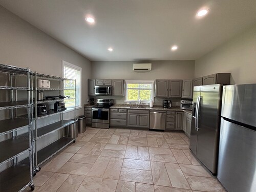 House on 112-acre farm with fenced pasture and new & old forest in Ten Mile, TN