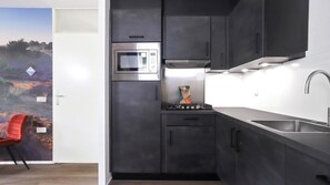 Microwave, stovetop, dishwasher, coffee/tea maker