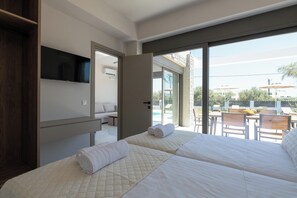 2 chambres, coffres-forts dans les chambres, fer et planche à repasser