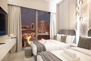 Superior appartement, balkon, uitzicht op de stad | Een kluis op de kamer, verduisterende gordijnen, geluiddichte muren