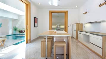 Villa | Private kitchen | Full-size fridge, microwave, oven, stovetop
