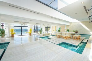 Villa | Living area | 55-inch Smart TV with digital channels - Royal Retreat Villa at Nurai Island (Abu Dhabi)