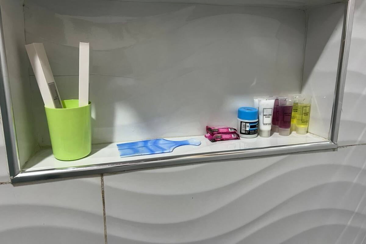 Shower, hydromassage showerhead, designer toiletries, hair dryer