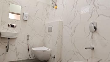 Shower, towels, soap, shampoo