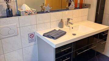 Shower, free toiletries, hair dryer, towels