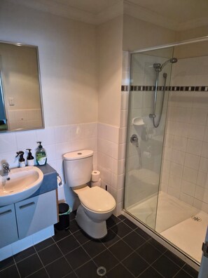 Shower, towels, toilet paper -  Stylish 2 Bedroom, 2 bathroom apartment with water views (Bunbury)