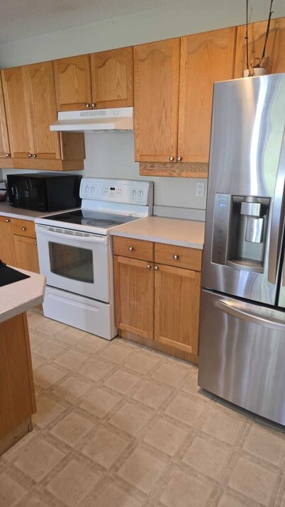 Charming suite in a townhome in wonderful Fort McMurray with AC