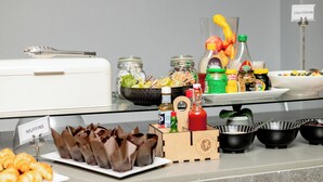 A buffet setup with labeled food items including muffins, croissants, and various condiments. - Khayalami Hotel Mbombela (Mbombela)